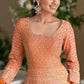 LaVante Fashion orange georgette Anarkali suit with intricate zari and sequin embroidery, perfect for weddings and festivals.