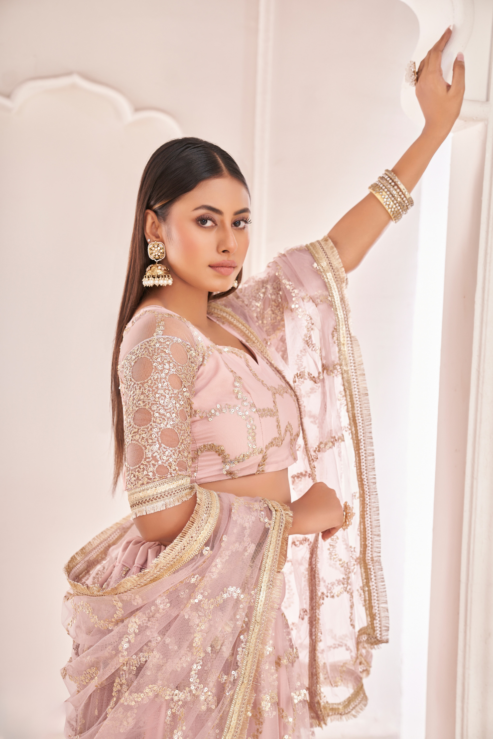 Elegant Net Lehenga Choli with Intricate Thread Embroidery