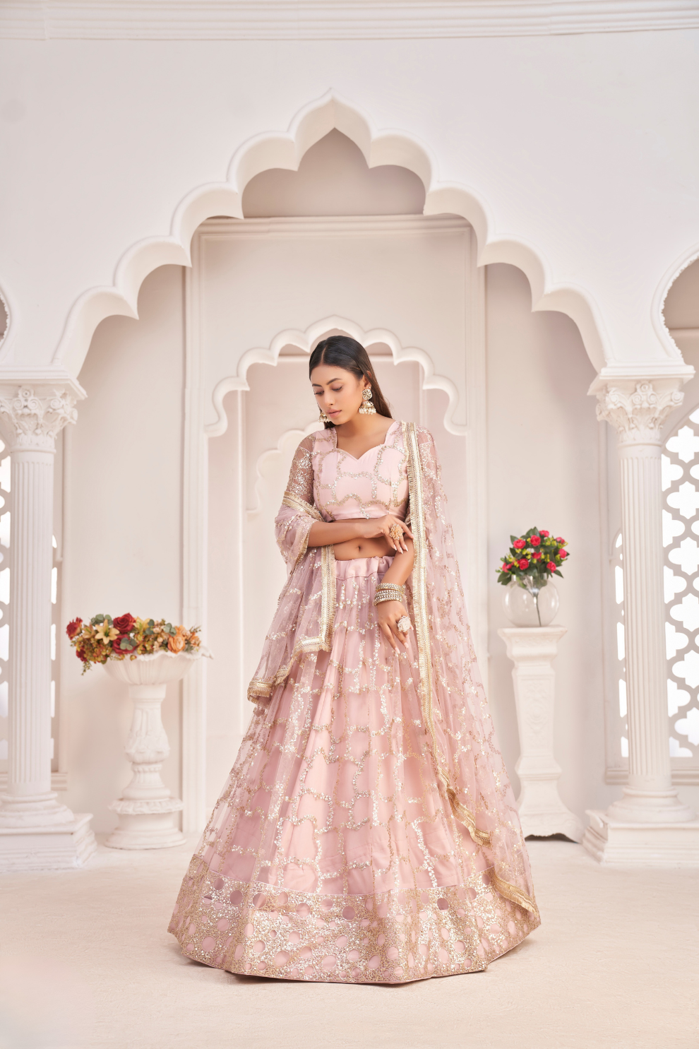 Elegant Net Lehenga Choli with Intricate Thread Embroidery
