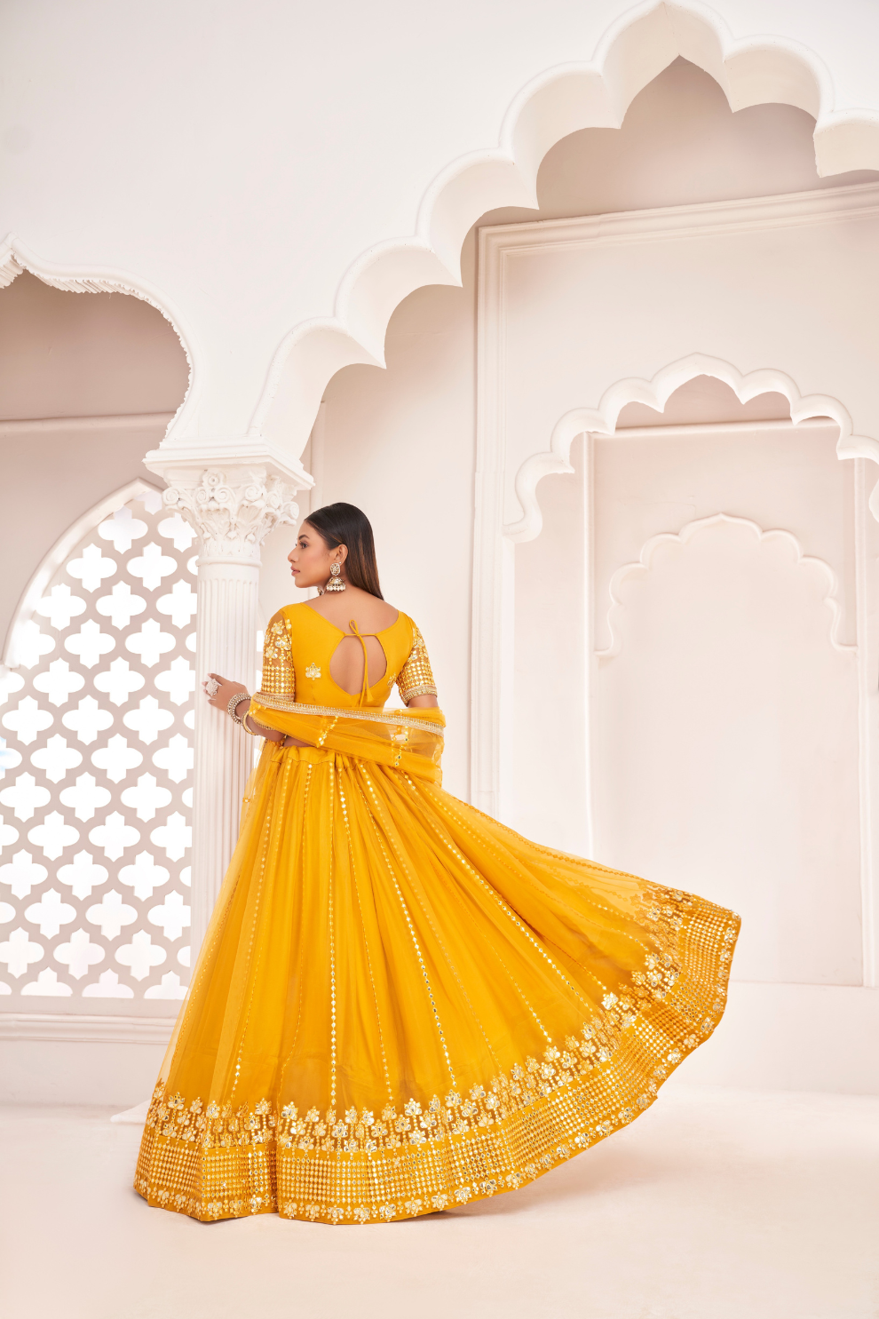 Elegant Net Lehenga Choli with Intricate Thread Embroidery