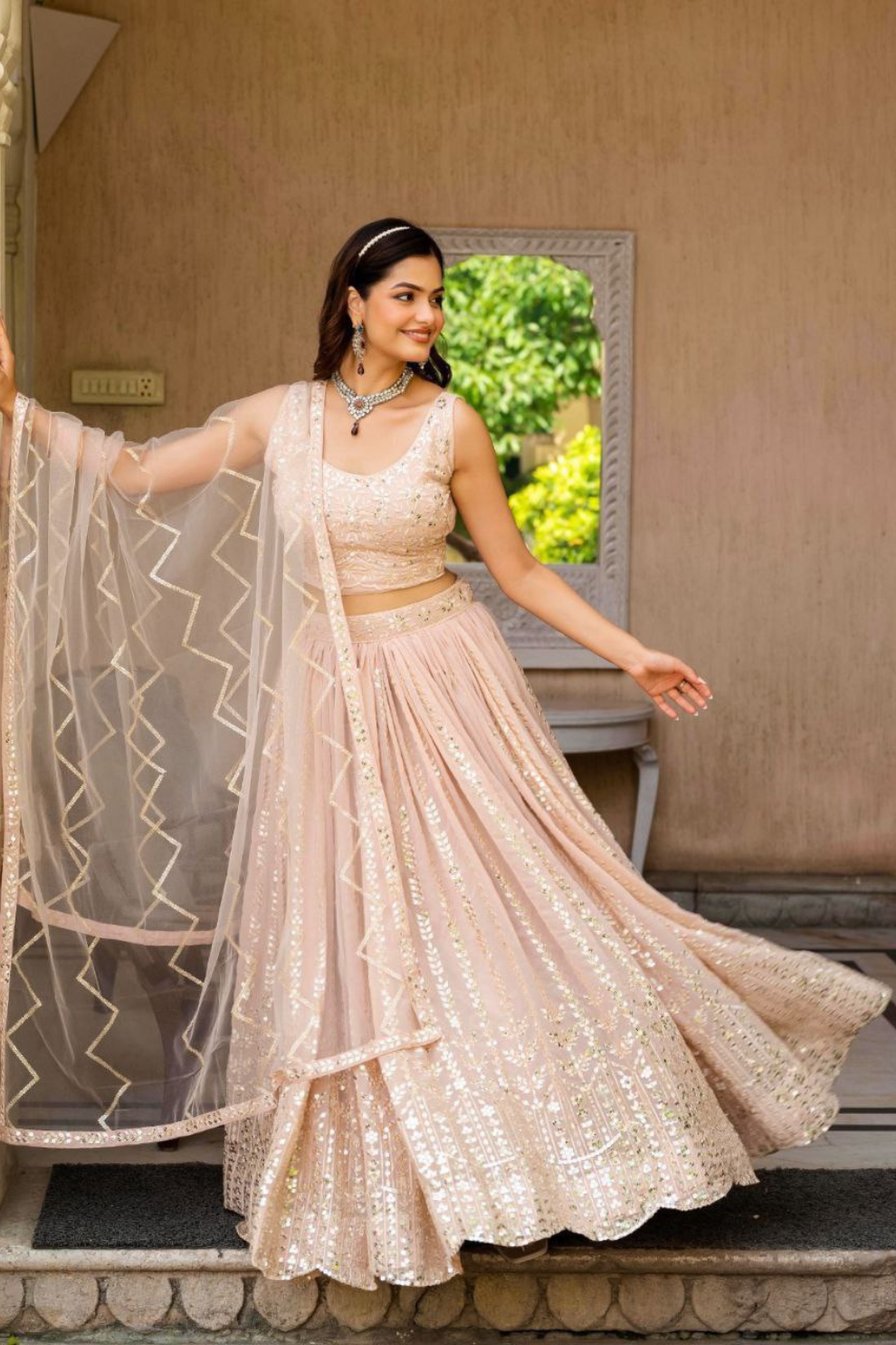 Elegant Peach Georgette Embroidered Lehenga Choli Set with Sequin Work