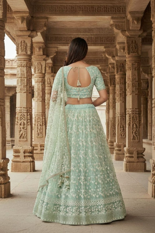 Pista Green Soft Net Thread Embroidery Work Lehenga Choli