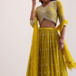 Mustard Yellow Georgette Lehenga Choli with Silver Embroidery and Ruffle Dupatta
