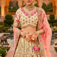 Charming Beige and Pink Embroidered Silk Lehenga Choli with Net Dupatta