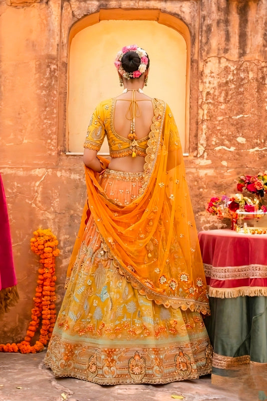 Sterling Mustard Yellow and Orange Embroidered Silk Bridal Lehenga Choli