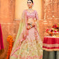 Light Pink and Pista Green Embroidered Silk Bridal Lehenga Choli
