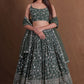 Semi-Stitched Dark Green Georgette Wedding Lehenga with Zari Embroidery