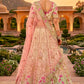 Charming Beige and Pink Embroidered Silk Lehenga Choli with Net Dupatta