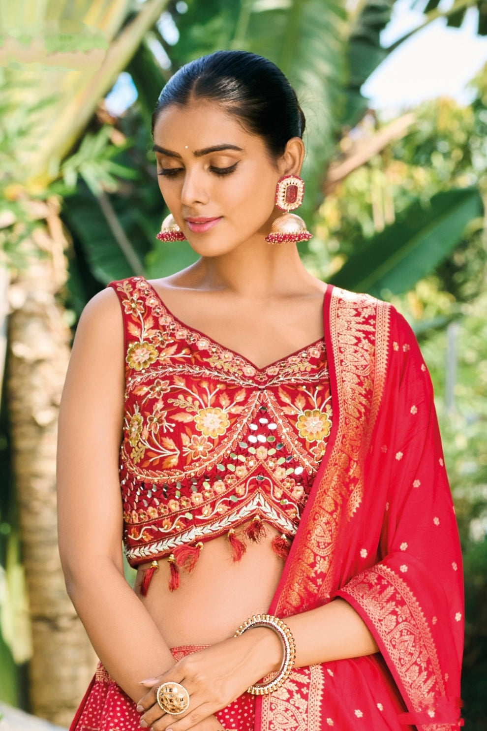 Designer Red Silk Embroidered Wedding Lehenga Choli with Gold Diamond and Cutdana Work